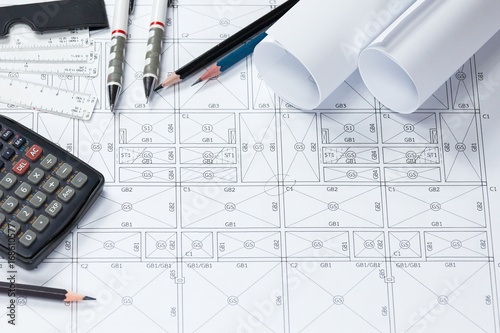 Abstract engineering drawings background with blank for your word. Construction plan tools with empty space on desk.