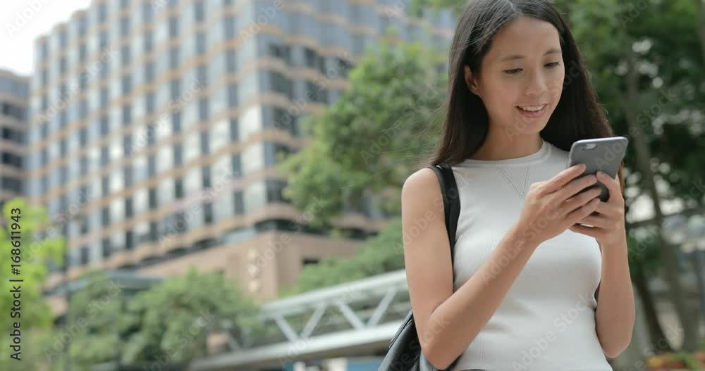 Woman use of smart phone in Hong Kong Woman use of smart phone in Hong Kong