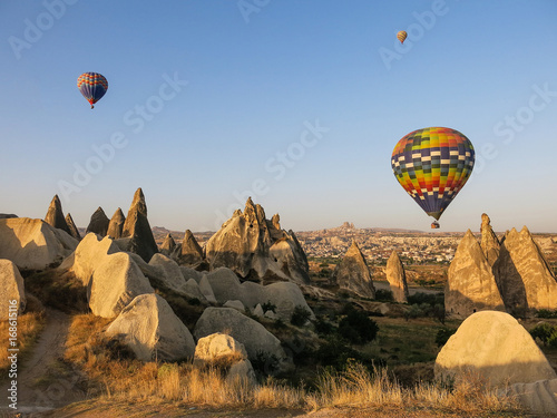 Hot air balloons flying over Cappadocia