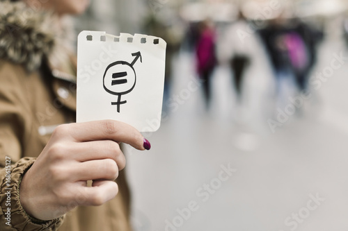 woman with a symbol for gender equality