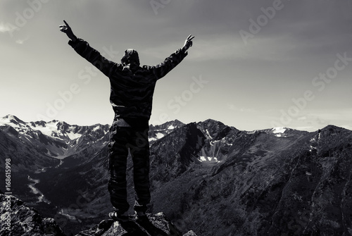 Obraz na plátne Standing raised arms man statue
