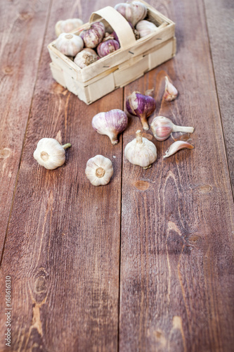 Garlic. Garlic Cloves and Garlic Bulb on a wooden vintage rustic table.