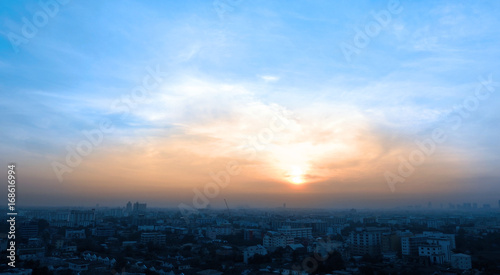 Sun rise on the sky and Bangkok city .