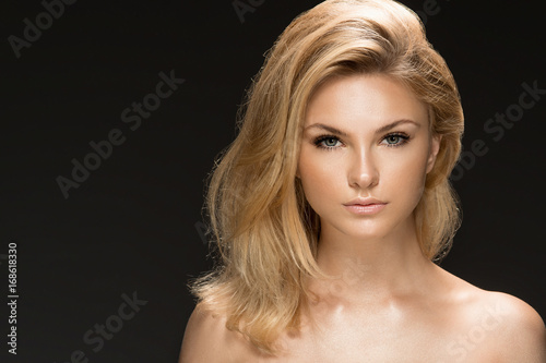 Glamour portrait of beautiful woman model. Summer glow on skin