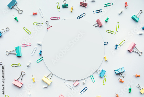 Set of colorful paper clips with white copy space background.business creativity concept.Flat lay design.