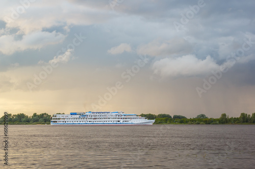 Cloud over the passenger ship on the Volga