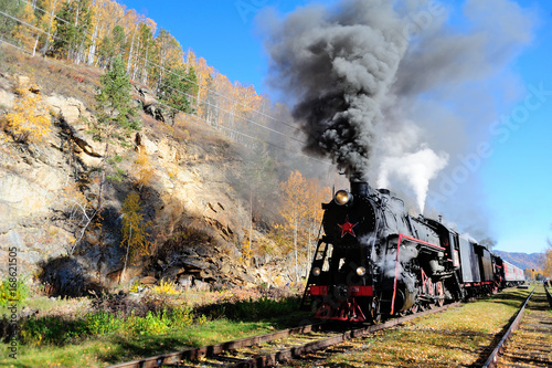 Vintage steam train in station beside of Lake Baikal,Russia.
