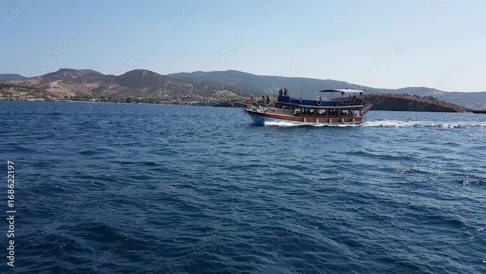 tour boat on blue sea sailing tour boat on blue sea sailing