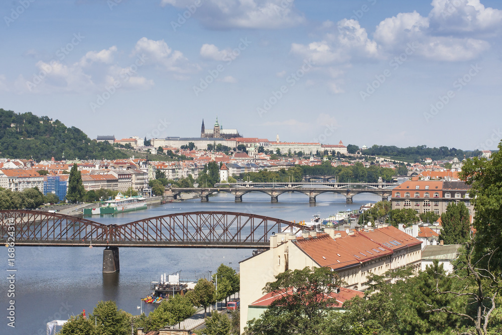 Prague city landscape. View from Visegrad. Bridges of Prague in sunny day. 