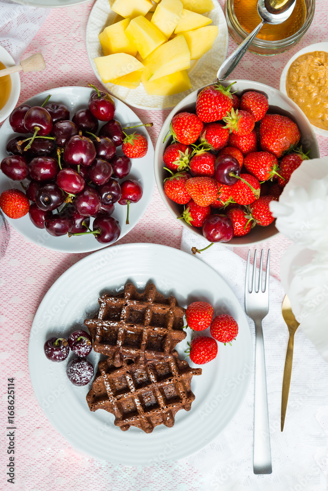Table Set for Breakfast with Waffles and Berries Table Set for Breakfast with Waffles and Berries