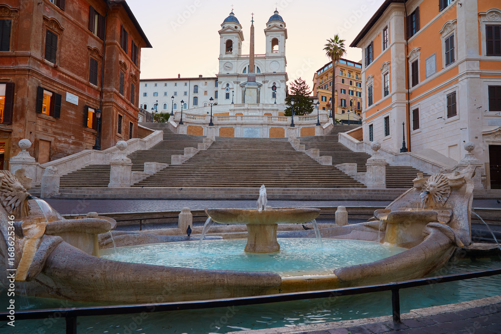 Spanish steps and fountain in Rome, Italy in the early morning without people