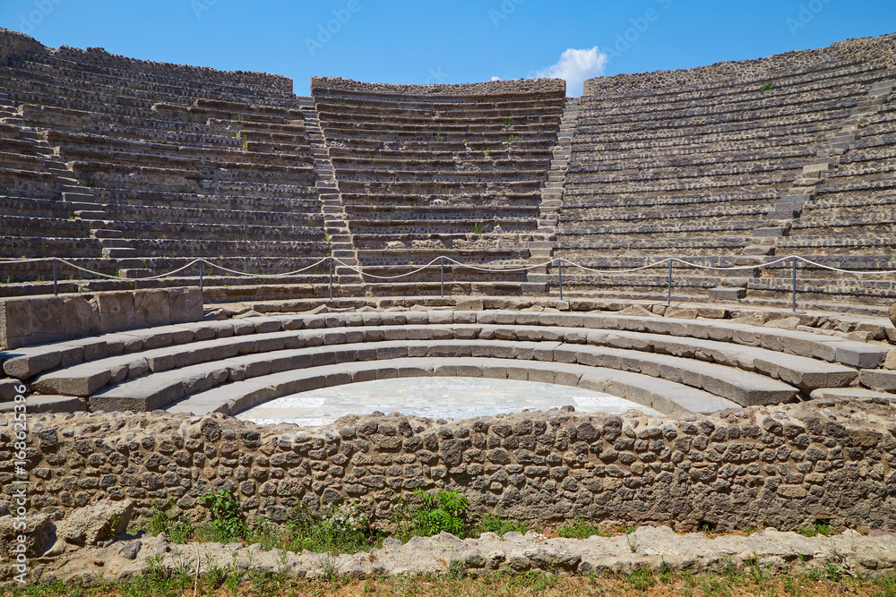 Small amphitheater in Pompeii, Italy on a summer sunny day