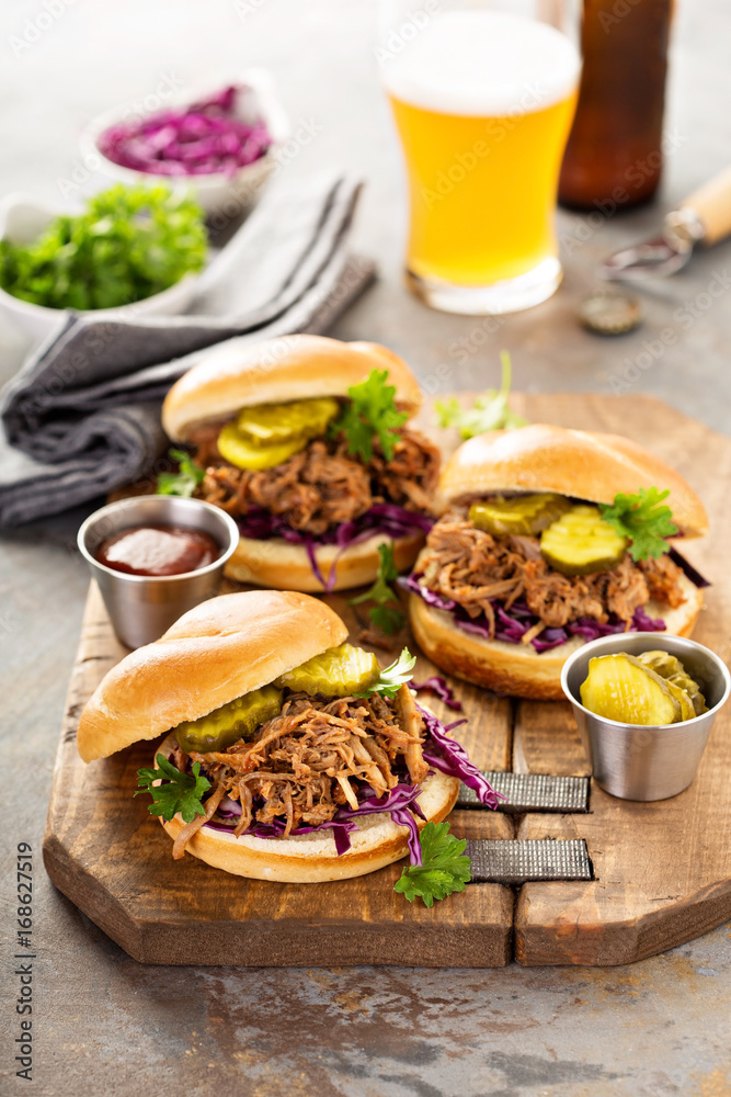 Pulled pork sandwiches with cabbage and pickles