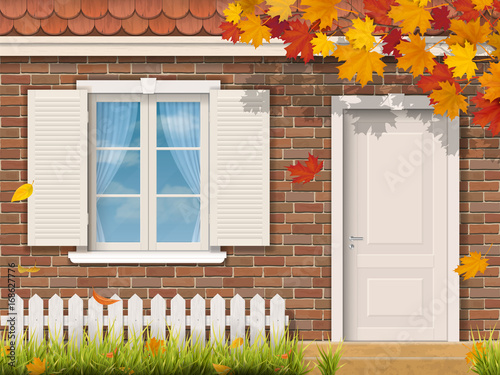 The brick house facade with dooryard in the autumn season. Maple tree branch with fallen leaves. Vector realistic illustration.