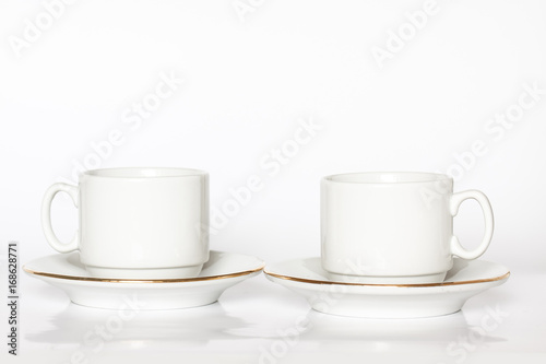 Two white tea cups and saucers mock up