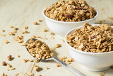 Two Bowls of Almond Breakfast Granola With Spoon Horizontal