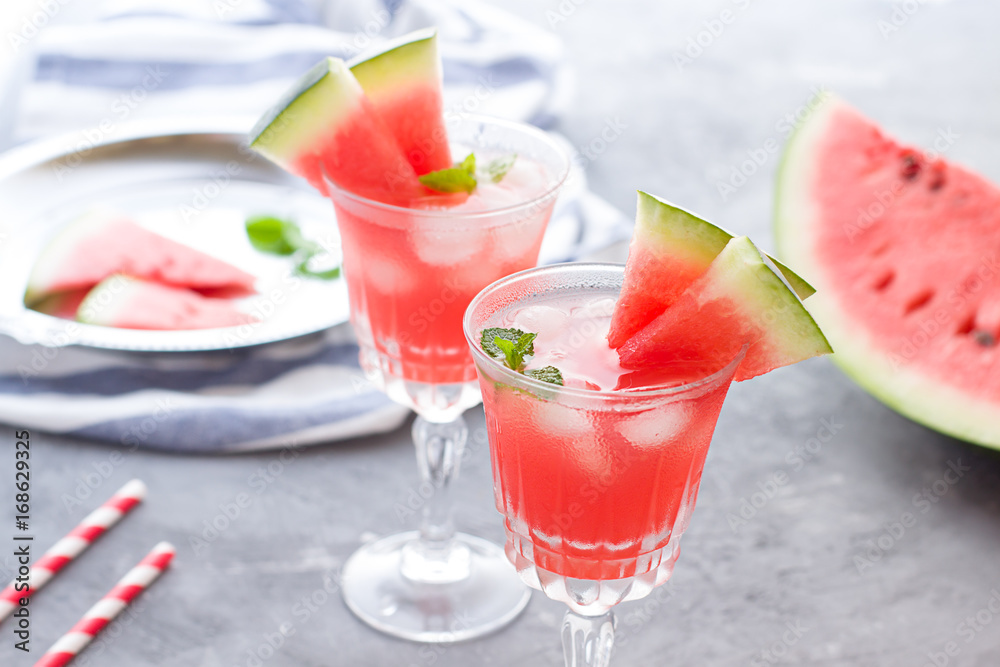 Watermelon cocktail with lemon and mint. Refreshing lemonade close up Watermelon cocktail with lemon and mint. Refreshing lemonade close up