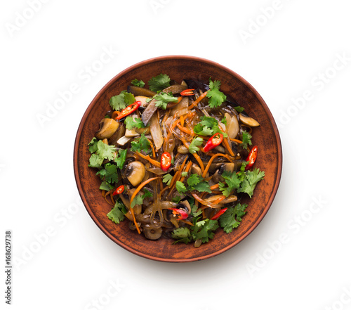 Asian food in a bowl isolated at white background