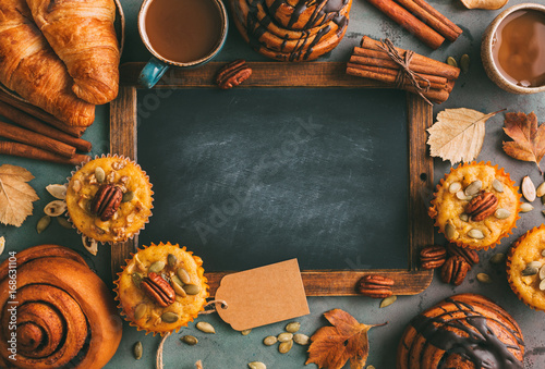 Recipe or menu chalk board, Pumpkin muffins and cinnamon rolls and coffee.