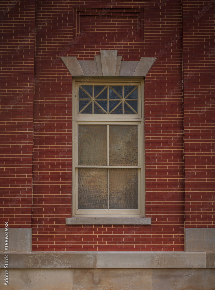 An ornate window in a old courthouse