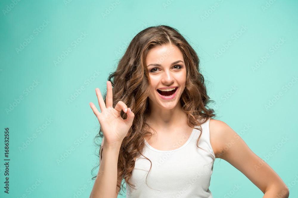 The young woman's portrait with happy emotions