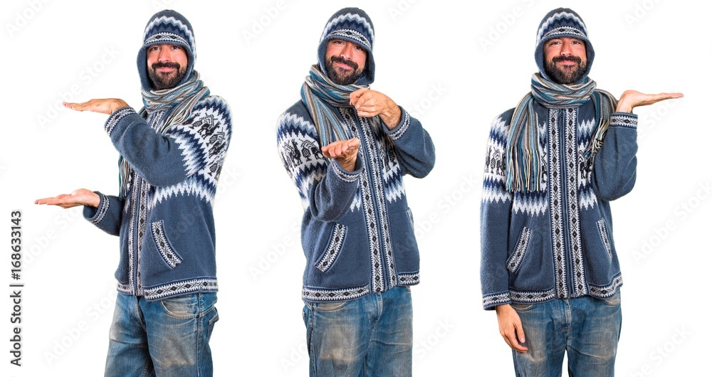 Set of Man with winter clothes holding something Set of Man with winter clothes holding something