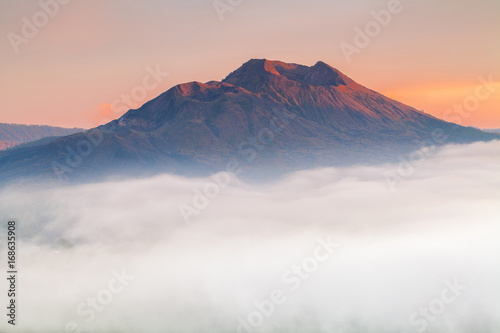 Kintamani volcano in the morning, viewed from Penelokan is a popular sightseeing destination in Bali's central highlands, Indonesia. photo