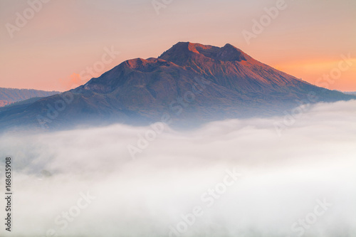 Kintamani volcano in the morning, viewed from Penelokan is a popular sightseeing destination in Bali's central highlands, Indonesia.