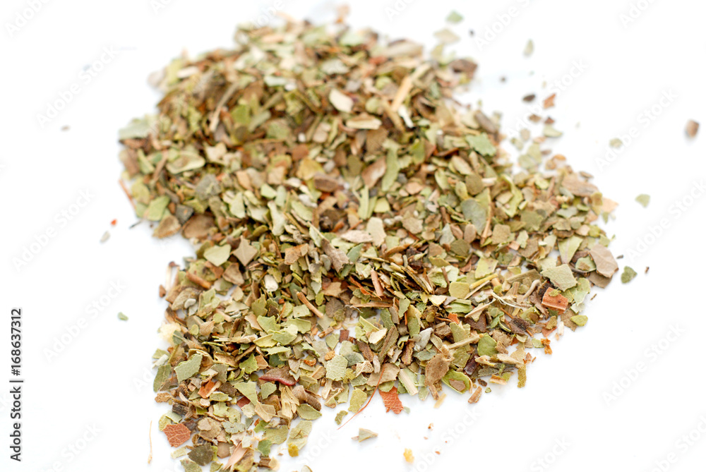 Pile of dried oregano leaves isolated on white background Pile of dried oregano leaves isolated on white background