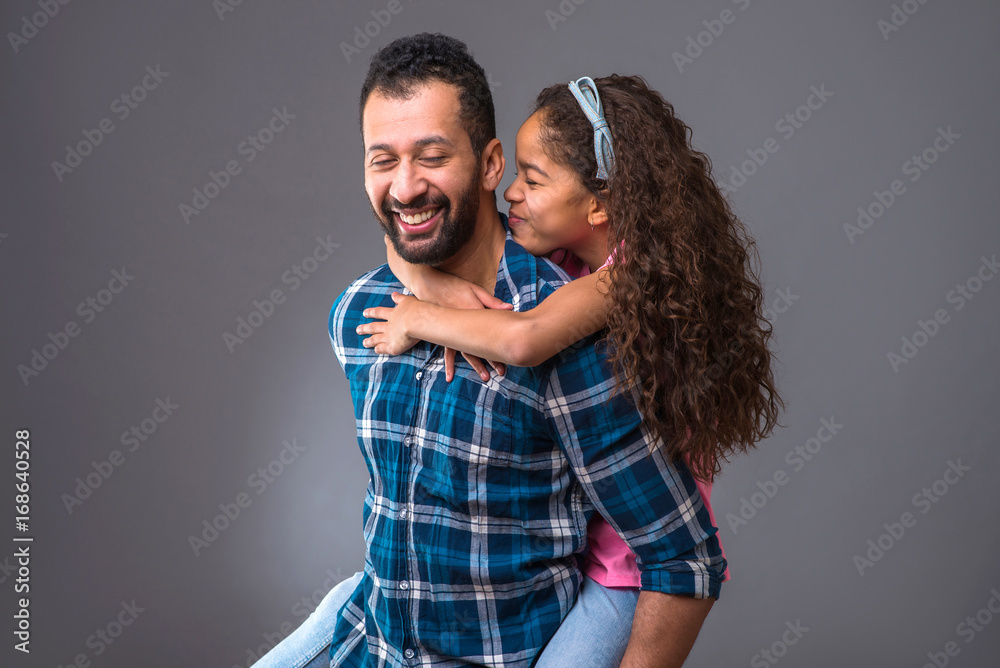 Naklejka premium Young black dad with his daughter