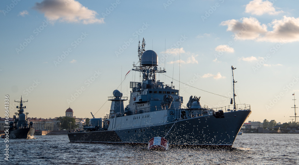 navy ship on the water