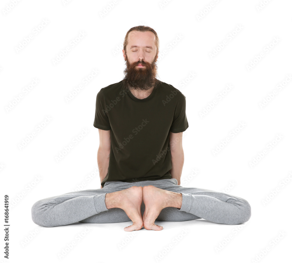 Young man practicing yoga on white background Young man practicing yoga on white background