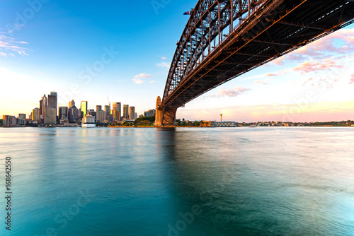 Fototapeta Naklejka Na Ścianę i Meble -  Sydney skyline and harbor bridge during sunrise, New South Wales Australia