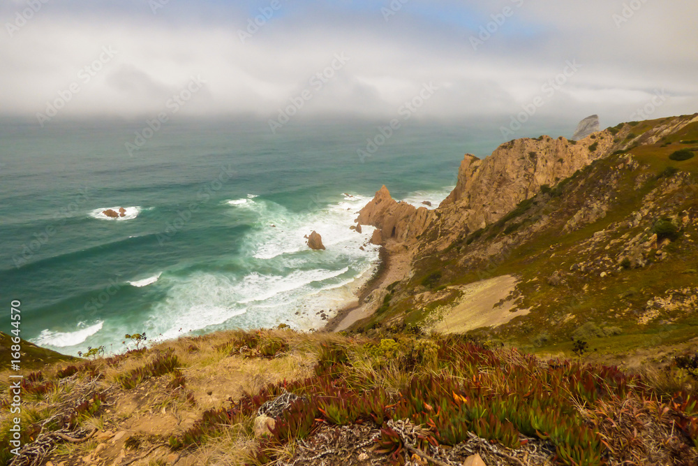 Praia da Aroeira viewed from above in Cabo da Roca - Sintra, Portugal Praia da Aroeira viewed from above in Cabo da Roca - Sintra, Portugal