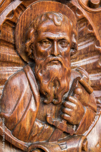 Wooden statue of St. Paul looking upwards.