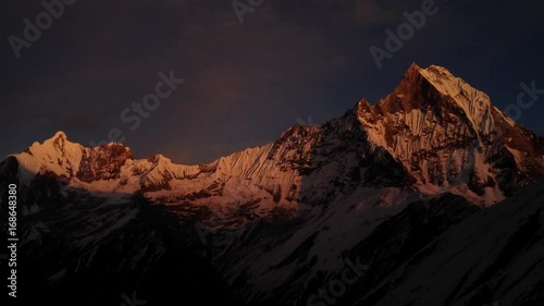 Timelapse with sunrise over Fish Tail with beautiful colours. Himalaya, Nepal photo