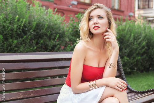 young beautiful girl in a white skirt