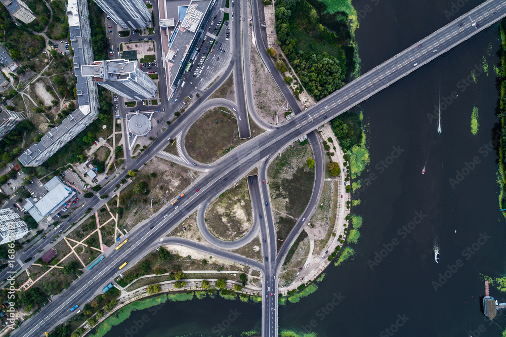 Fragment of the road junction in Kiev near the residential area of Rusanovka. Aerial view. From above