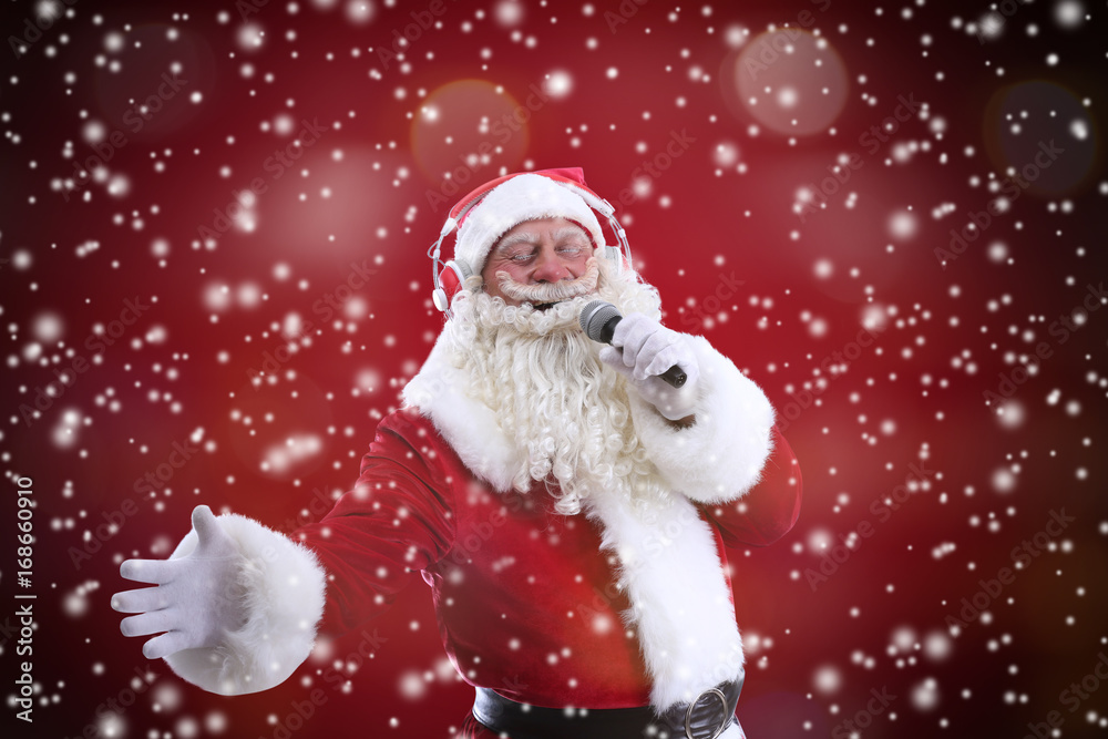 Santa Claus singing songs on color background. Christmas and New Year music Santa Claus singing songs on color background. Christmas and New Year music