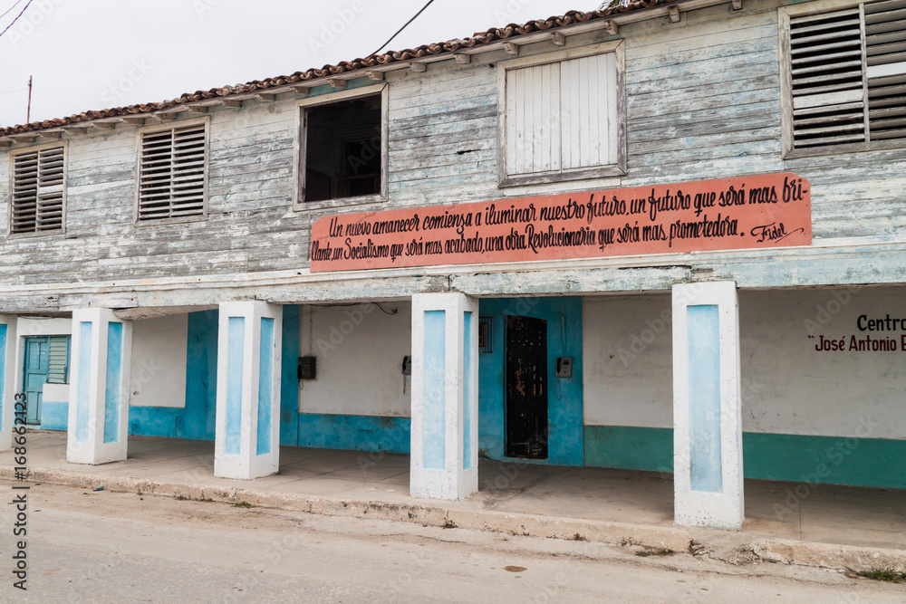 GIBARA,  CUBA - JAN 29, 2016: Fidel Castro's quote on a building in Gibara village