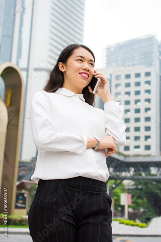 Business woman having a phone call