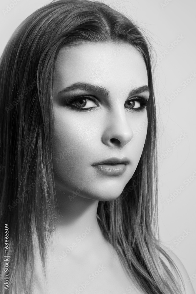 Fashionable portrait of a girl model. Fashion, smoky eyes makeup. Fashionable portrait of a girl model. Fashion, smoky eyes makeup.