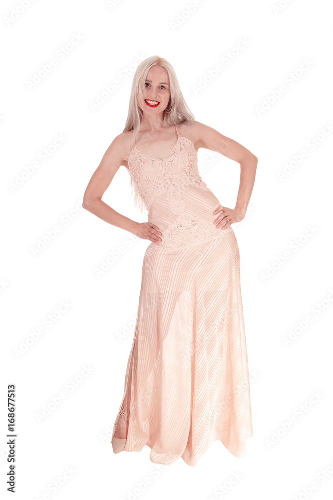 Beautiful woman in light pink evening dress