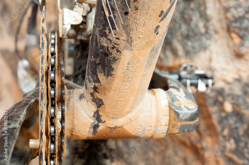 Fototapeta Naklejka Na Ścianę i Meble -  Mud Dirty Chainring and chain in a mountain bike