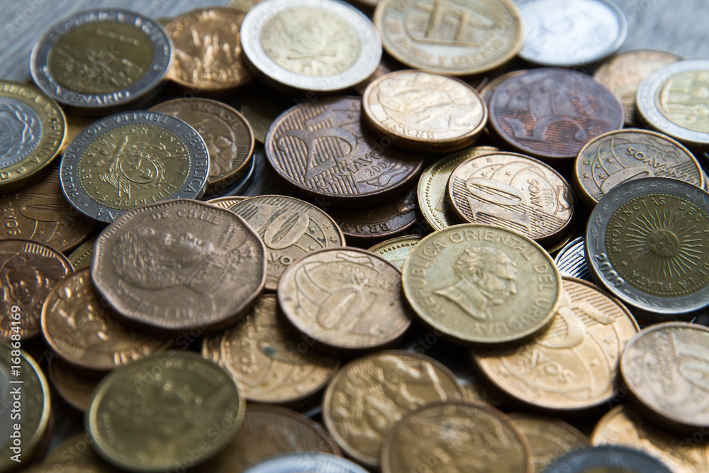 Mix of coins on neutral background Mix of coins on neutral background