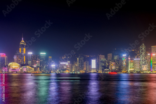 Hong Kong skyline view from kowloon side colorful night life cityscape and reflection on water