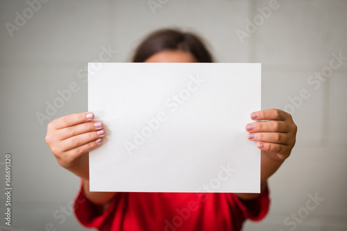 Girl with Blank Paper