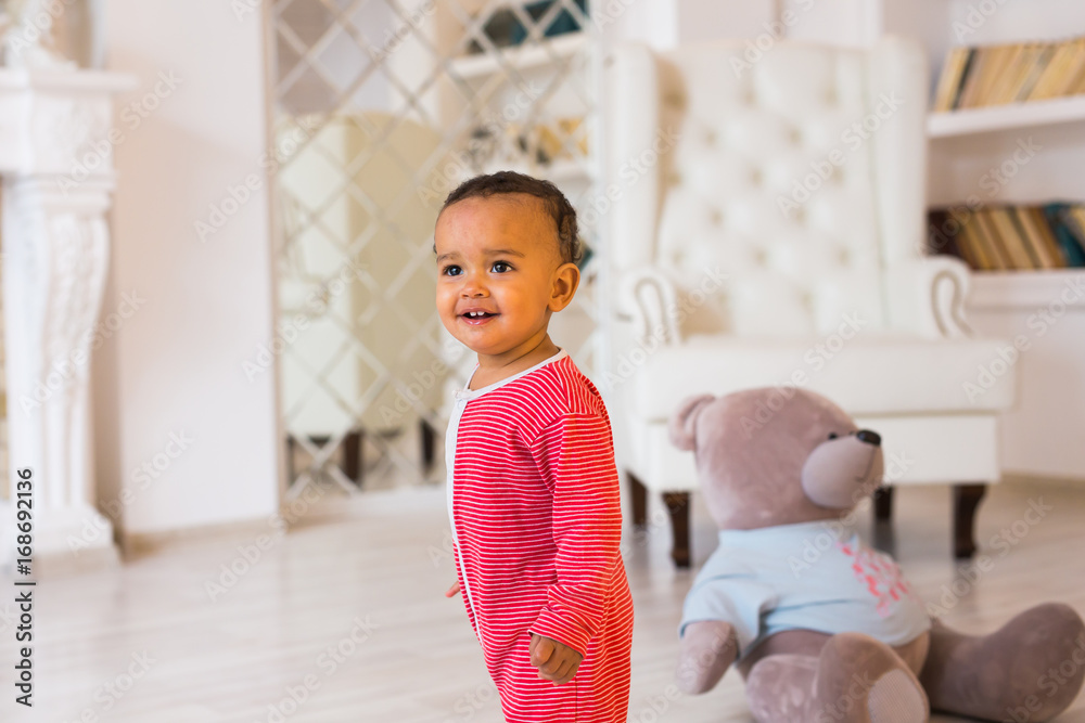 Fototapeta premium Portrait of mixed race kid at home
