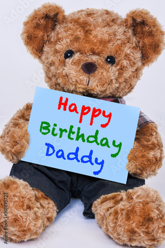 Photography Teddy bear holding  blue sign saying Happy Birthday Daddy