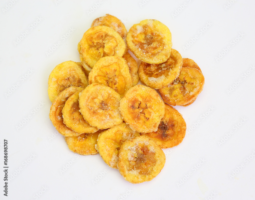 dried banana slices coated with sugar isolated on white background.